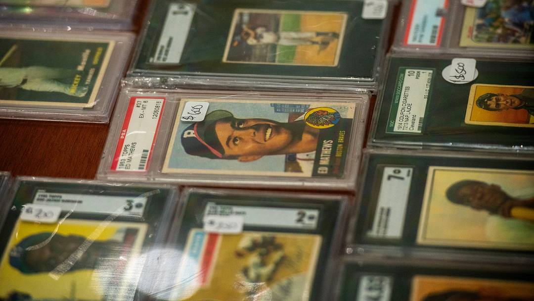 Card collectors check out the items for sale duing Cards on the Coast Sports Card and TCG Show Saturday, Sept. 27, 2025 at Sanders Beach Corrine Jones Resource Center. The show had sports cards, collectable trading card games, food trucks and more.
