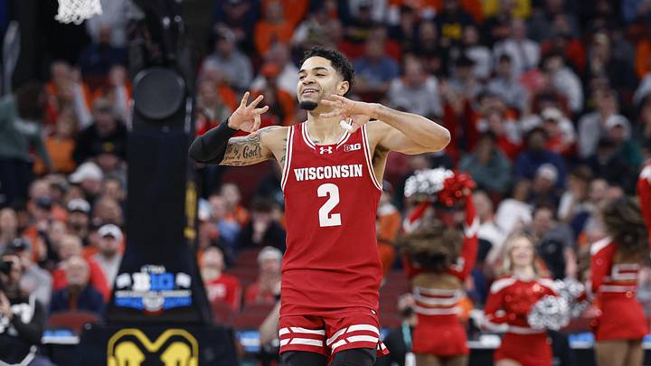 Mar 13, 2026; Chicago, IL, USA; Wisconsin Badgers guard Nick Boyd (2) celebrates after scoring against the Illinois Fighting Illini during the first half at United Center. Mandatory Credit: Kamil Krzaczynski-Imagn Images