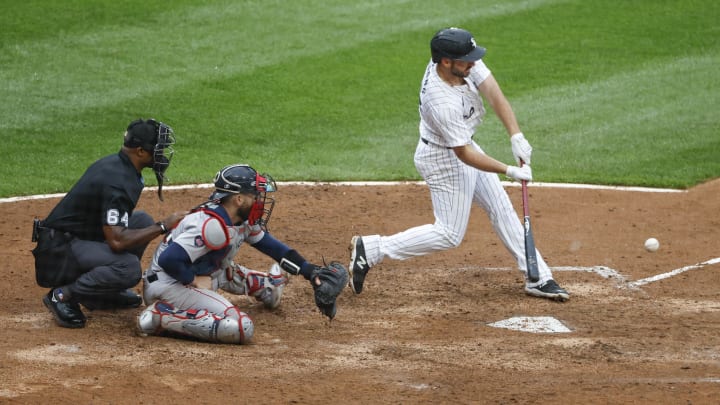 Jun 8, 2024; Chicago, Illinois, USA; Chicago White Sox shortstop Paul DeJong (29) singles against the Boston Red Sox during the fifth inning at Guaranteed Rate Field. Mandatory Credit: Kamil Krzaczynski-USA TODAY Sports