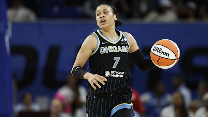 Aug 25, 2024; Chicago, Illinois, USA; Chicago Sky guard Chennedy Carter (7) brings the ball up court against the Las Vegas Aces during the first half at Wintrust Arena. Mandatory Credit: Kamil Krzaczynski-Imagn Images