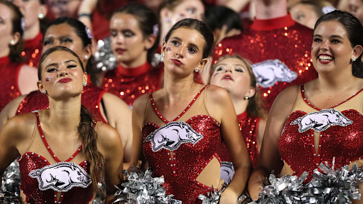 Aug 29, 2024; Little Rock, Arkansas, USA; Arkansas Razorbacks baton twirlers cheer during the fourth quarter against the Pine Bluff Golden Lions at War Memorial Stadium. Arkansas won 70-0. Mandatory Credit: Nelson Chenault-Imagn Images