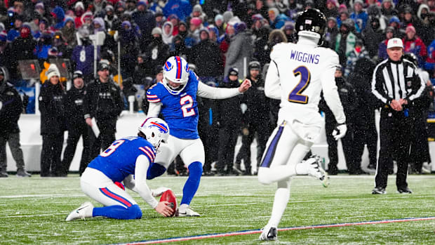 Jan 19, 2025; Orchard Park, New York, USA; Buffalo Bills place kicker Tyler Bass (2) kicks an extra point during the second q