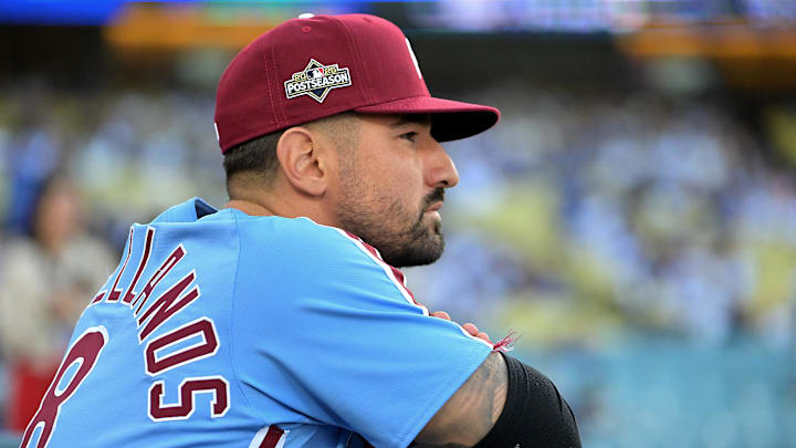 Oct 8, 2025; Los Angeles, California, USA; Philadelphia Phillies right fielder Nick Castellanos (8) looks on from the dugout during game three of the NLDS of the 2025 MLB playoffs against the Los Angeles Dodgers at Dodger Stadium. Mandatory Credit: Jayne Kamin-Oncea-Imagn Images