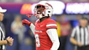 Dec 18, 2024; Inglewood, CA, USA;    defensive back Jett Elad (9) celebrates after a play in the first half against the California Golden Bears at SoFi Stadium. Mandatory Credit: Jayne Kamin-Oncea-Imagn Images