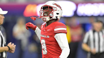 Dec 18, 2024; Inglewood, CA, USA;    defensive back Jett Elad (9) celebrates after a play in the first half against the California Golden Bears at SoFi Stadium. Mandatory Credit: Jayne Kamin-Oncea-Imagn Images