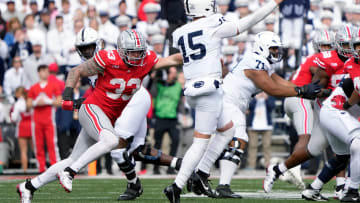 Ohio State Buckeyes defensive end Jack Sawyer (33) can't get to Penn State Nittany Lions quarterback Drew Allar (15)