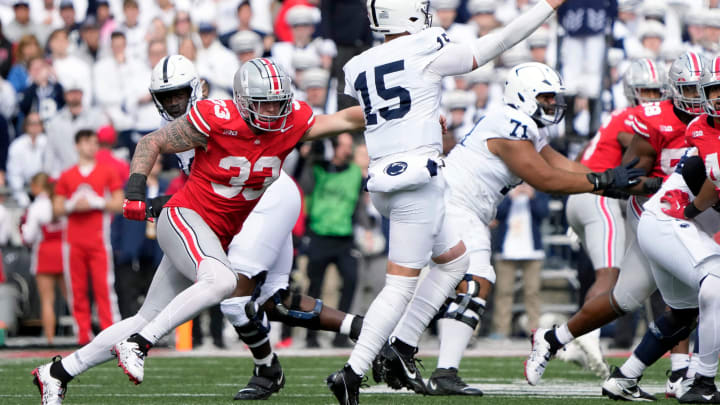 Ohio State Buckeyes defensive end Jack Sawyer (33) can't get to Penn State Nittany Lions quarterback Drew Allar (15)