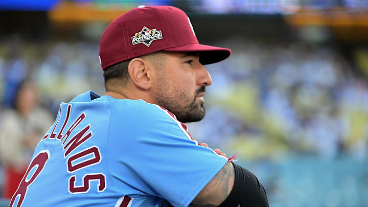 Oct 8, 2025; Los Angeles, California, USA; Philadelphia Phillies right fielder Nick Castellanos (8) looks on from the dugout during game three of the NLDS of the 2025 MLB playoffs against the Los Angeles Dodgers at Dodger Stadium. Mandatory Credit: Jayne Kamin-Oncea-Imagn Images