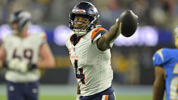 Dec 19, 2024; Inglewood, California, USA;  Denver Broncos wide receiver Courtland Sutton (14) signals after a first down in the first half against the Los Angeles Chargers at SoFi Stadium. Mandatory Credit: Jayne Kamin-Oncea-Imagn Images