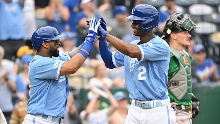 Jun 25, 2022; Kansas City, Missouri, USA;  Kansas City Royals center fielder Michael A. Taylor (2) celebrates with Kansas City Royals first baseman Carlos Santana (41) after hitting a three-run home during the eighth inning against the Oakland Athletics at Kauffman Stadium. Mandatory Credit: Peter Aiken-Imagn Images