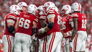 The Nebraska Cornhuskers huddle during a game against the Northern Iowa Panthers.