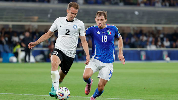 Nicolo Barella of Italy and Marten Kuusk of Estonia seen in...