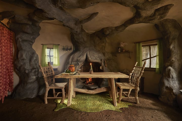 dining table in shrek's swamp on airbnb