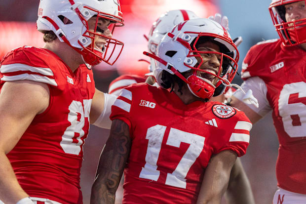 Nebraska wide receiver Jacory Barney Jr. celebrates with teammates after a 10-yard touchdown run against Northern Iowa.