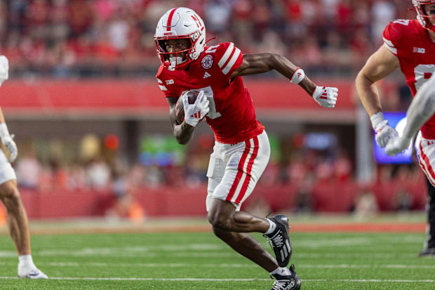 Nebraska wide receiver Jacory Barney Jr. rushes for a 10-yard touchdown during Nebraska's 34-3 win against Northern Iowa.