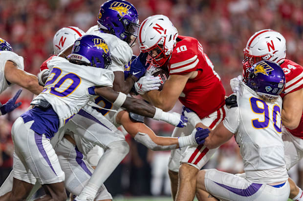 Nebraska quarterback Heinrich Haarberg rushes for a short gain against Northern Iowa.