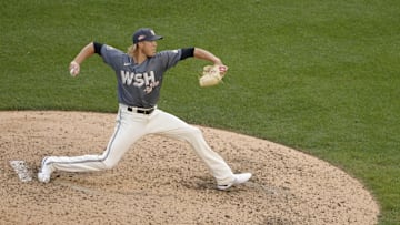 Jul 16, 2022; Washington, District of Columbia, USA; Washington Nationals relief pitcher Jordan Weems (51) pitches against the Atlanta Braves during the eighth inning at Nationals Park. Mandatory Credit: Geoff Burke-Imagn Images