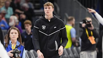 Mar 14, 2025; Charlotte, NC, USA; Duke Blue Devils forward Cooper Flagg (2) walks to the bench during the first half against the North Carolina Tar Heels at Spectrum Center. Mandatory Credit: Jim Dedmon-Imagn Images