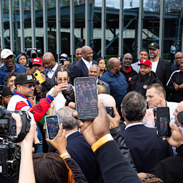 Apr 12, 2024; Camden, NJ, USA; Philadelphia 76ers great Allen Iverson touches the head of his statue during a ceremony outside Penn Medicine Philadelphia 76ers Training Complex. Mandatory Credit: Bill Streicher-Imagn Images