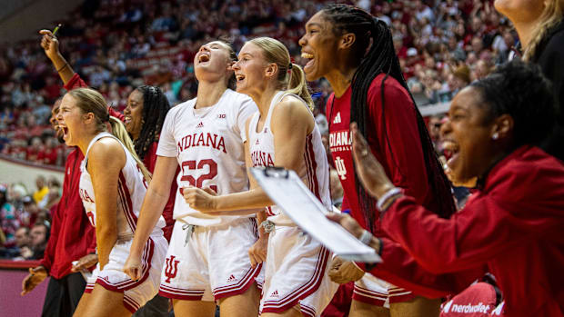 Indiana's Julianna LaMendola (20), Lilly Meister (52), Henna Sandvik (21), and Sharnecce Currie-Jelks (23) celebrate.