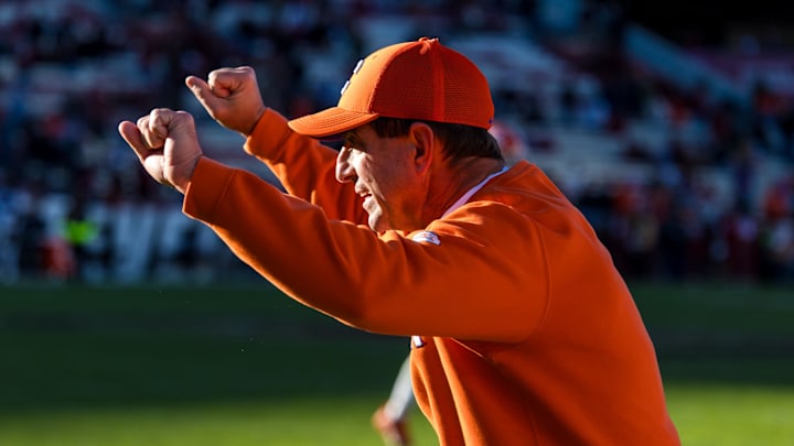 Nov 29, 2025; Columbia, South Carolina, USA; Clemson Tigers head coach Dabo Swinney celebrates a play against the South Carolina Gamecocks in the fourth quarter at Williams-Brice Stadium. Mandatory Credit: Jeff Blake-Imagn Images