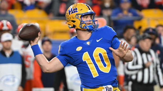 Pittsburgh Panthers quarterback Eli Holstein (10) throws a pass during the first quarter against Syracuse.