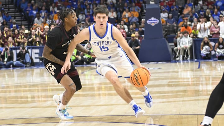 Kentucky Wildcats guard Reed Sheppard drives down the lane against the Texas A&M Aggies during the second half at Bridgestone Arena. Kentucky Wildcats guard Reed Sheppard drives down the lane against the Texas A&M Aggies during the second half at Bridgestone Arena.