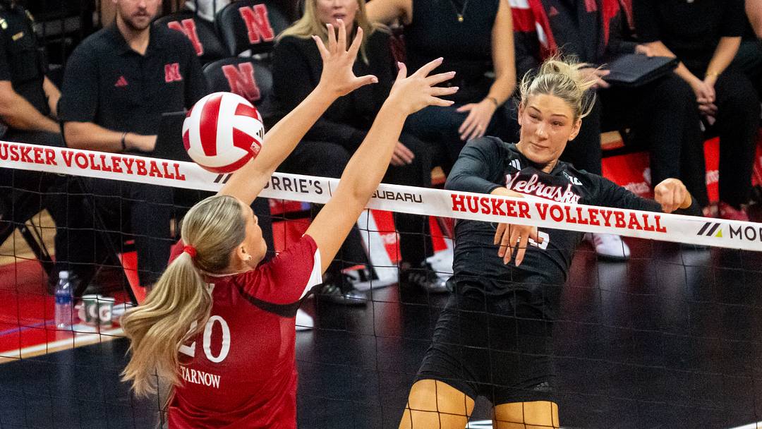 Oct 10, 2026; Lincoln, Nebraska, USA; Nebraska Cornhuskers middle blocker Andi Jackson (15) gets a kill against Wisconsin Badgers middle blocker Lynney Tarnow (20) during the second set at Bob Devaney Sport Center. Mandatory Credit: Dylan Widger-Imagn Images Oct 10, 2026; Lincoln, Nebraska, USA; Nebraska Cornhuskers middle blocker Andi Jackson (15) gets a kill against Wisconsin Badgers middle blocker Lynney Tarnow (20) during the second set at Bob Devaney Sport Center. Mandatory Credit: Dylan Widger-Imagn Images