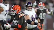 Cleveland Browns linebacker Devin Bush (30) returns an interception for a touchdown against the Baltimore Ravens during the first half of NFL football game at Huntington Bank Field, Nov. 16, 2025, in Cleveland, Ohio.