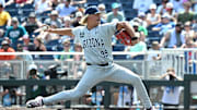 Jun 13, 2025; Omaha, Neb, USA; Arizona Wildcats pitcher Garrett Hicks (99) throws against the Coastal Carolina Chanticleers during the seventh inning at Charles Schwab Field. Mandatory Credit: Steven Branscombe-Imagn Images