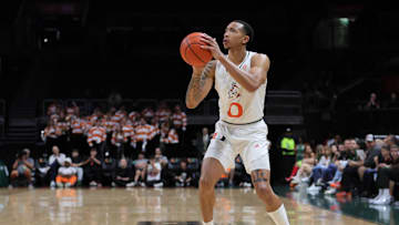 Mar 6, 2024; Coral Gables, Florida, USA; Miami Hurricanes guard Matthew Cleveland (0) shoots the basketball against the Boston College Eagles during the second half at Watsco Center. Mandatory Credit: Sam Navarro-Imagn Images