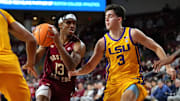 Boston College men's basketball guard Donald Hand Jr. with the ball against LSU at Conte Forum on Dec. 3, 2025. 