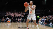 Mar 6, 2024; Coral Gables, Florida, USA; Miami Hurricanes guard Matthew Cleveland (0) shoots the basketball against the Boston College Eagles during the second half at Watsco Center. Mandatory Credit: Sam Navarro-Imagn Images