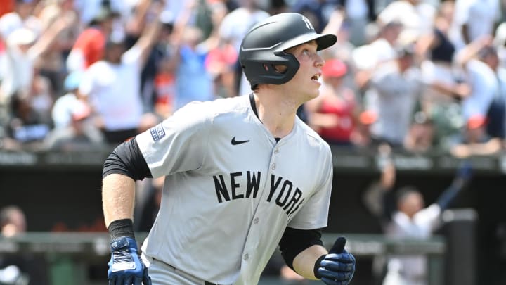 Jul 14, 2024; Baltimore, Maryland, USA;  New York Yankees first baseman Ben Rice (93) hits a three-run home run during the ninth inning against the Baltimore Orioles at Oriole Park at Camden Yards. 