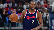 Apr 24, 2025; Inglewood, California, USA; Los Angeles Clippers forward Kawhi Leonard (2) moves the ball up court against the Denver Nuggets during the second half of game three in the first round for the 2024 NBA Playoffs at Intuit Dome. Mandatory Credit: Gary A. Vasquez-Imagn Images