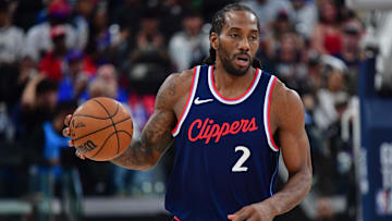 Apr 24, 2025; Inglewood, California, USA; Los Angeles Clippers forward Kawhi Leonard (2) moves the ball up court against the Denver Nuggets during the second half of game three in the first round for the 2024 NBA Playoffs at Intuit Dome. Mandatory Credit: Gary A. Vasquez-Imagn Images