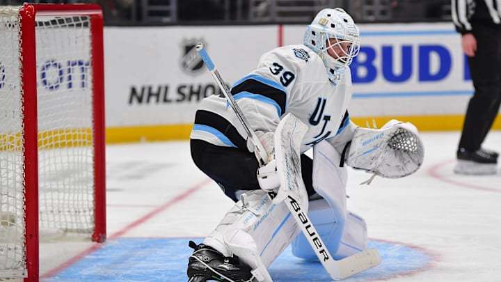 Feb 22, 2025; Los Angeles, California, USA; Utah Hockey Club goaltender Connor Ingram (39) defends the goal against the Los Angeles Kings during the second period  at Crypto.com Arena. Mandatory Credit: Gary A. Vasquez-Imagn Images