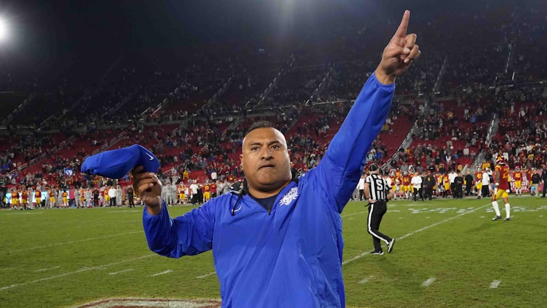 Nov 27, 2021; Los Angeles, California, USA; BYU Cougars head coach Kalani Sitake celebrates in the second half against the Southern California Trojans at United Airlines Field at Los Angeles Memorial Coliseum. Mandatory Credit: Kirby Lee-Imagn Images
