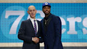 Jun 21, 2018; Brooklyn, NY, USA; Mikal Bridges (Villanova) greets NBA commissioner Adam Silver after being selected as the number ten overall pick to the Philadelphia 76ers in the first round of the 2018 NBA Draft at the Barclays Center. Mandatory Credit: Brad Penner-USA TODAY Sports