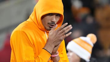 Tennessee quarterback Nico Iamaleava tries to keep warm before a College Football Playoff game against Ohio State.