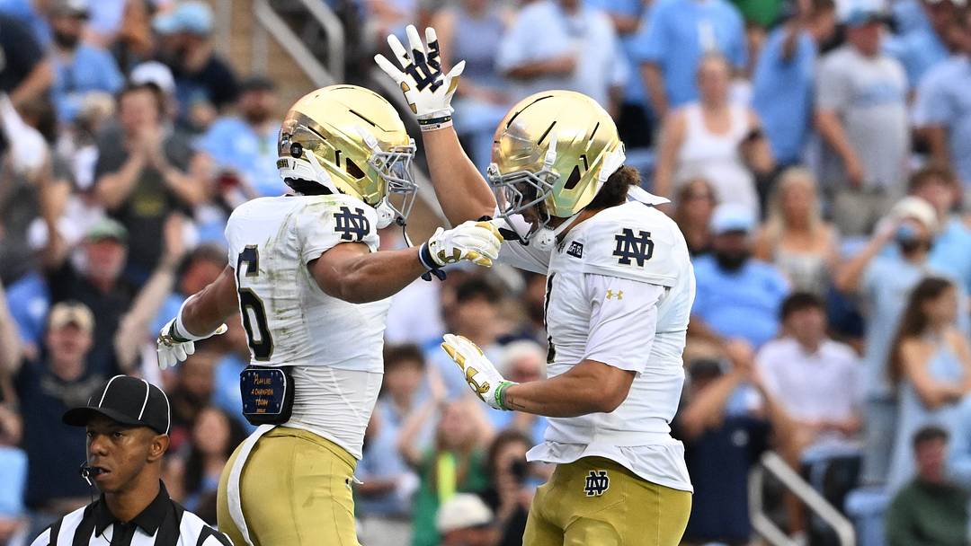 Oct 3, 2026; Chapel Hill, North Carolina, USA;  Notre Dame Fighting Irish wide receiver Jordan Faison (6) celebrates with wide receiver Jaden Greathouse (1) after making a touchdown catch in the first quarter at Kenan Stadium. Mandatory Credit: Bob Donnan-Imagn Images