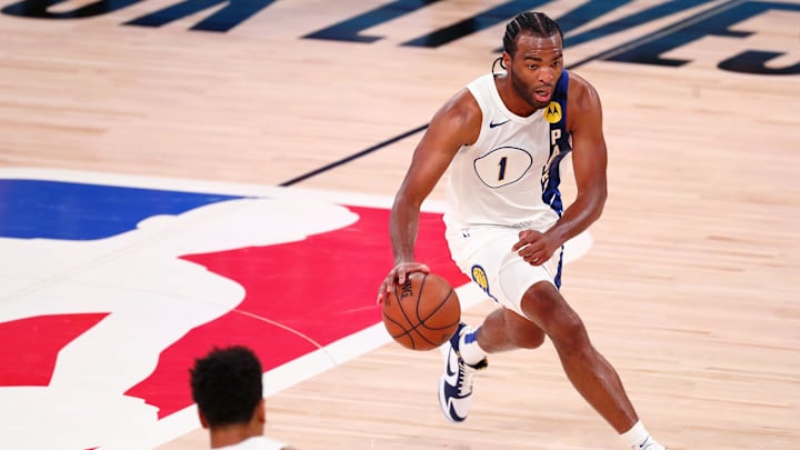 Aug 22, 2020; Lake Buena Vista, Florida, USA; Indiana Pacers forward T.J. Warren (1) dribbles against the Miami Heat during the second half of Game 3 of an NBA basketball first-round playoff series at AdventHealth Arena. Mandatory Credit: Kim Klement-Imagn Images