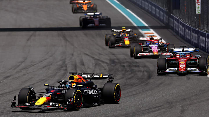 May 4, 2024; Miami Gardens, Florida, USA; Red Bull Racing driver Max Verstappen (1) lead the field into turn one during the F1 Sprint Race at Miami International Autodrome. Mandatory Credit: Peter Casey-Imagn Images