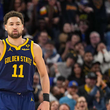 Jan 27, 2024; San Francisco, California, USA; Golden State Warriors guard Klay Thompson (11) gestures after making a three point basket against the Los Angeles Lakers during the third quarter at Chase Center. Mandatory Credit: Darren Yamashita-Imagn Images