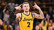 Feb 22, 2025; Iowa City, Iowa, USA; Iowa Hawkeyes guard Brock Harding (2) reacts during the second half against the Washington Huskies at Carver-Hawkeye Arena. Mandatory Credit: Jeffrey Becker-Imagn Images