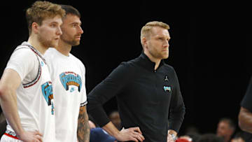 Apr 13, 2025; Memphis, Tennessee, USA Memphis Grizzlies interim head coach Tuomas Iisalo (right) looks on during the first quarter against the Dallas Mavericks at FedExForum. Mandatory Credit: Petre Thomas-Imagn Images