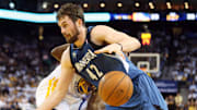 Minnesota Timberwolves forward Kevin Love loses the ball against Golden State Warriors forward Draymond Green during the first quarter at Oracle Arena in Oakland, Calif., on April 14, 2014.