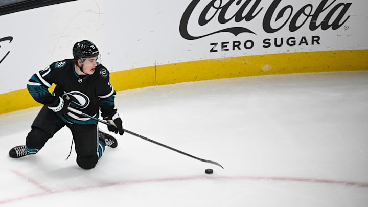 Apr 3, 2025; San Jose, California, USA; San Jose Sharks center Macklin Celebrini (71) controls the puck against the Edmonton Oilers in the third period at SAP Center at San Jose. Mandatory Credit: Eakin Howard-Imagn Images