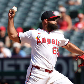 Jul 28, 2024; Anaheim, California, USA;  Los Angeles Angels relief pitcher Luis Garcia (66) pitches during the ninth inning against the Oakland Athletics at Angel Stadium. Mandatory Credit: Kiyoshi Mio-USA TODAY Sports