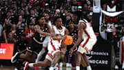 Feb 24, 2025; Lubbock, Texas, USA;  Houston Cougars guard LJ Cryer (4) works the ball in front of Texas Tech Red Raiders guard Christian Anderson (4) in the second half at United Supermarkets Arena. Mandatory Credit: Michael C. Johnson-Imagn Images